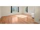 The living room features hardwood floors and plenty of natural light from the two windows at 2826 Summit Ridge Dr, Marietta, GA 30066