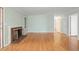 Bright living area with a vintage fireplace, wood floors, and plenty of natural light at 2826 Summit Ridge Dr, Marietta, GA 30066