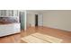 Bright living area features hardwood floors, kitchenette, large window and mirrored closet at 2826 Summit Ridge Dr, Marietta, GA 30066