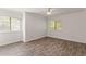 Spacious bedroom with hardwood floors, natural light, and neutral paint scheme at 7007 Wingate Way, Atlanta, GA 30350