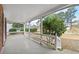 Covered front porch with white railing and brick accents, offering a relaxing outdoor space at 4608 Rosemear Ct, Norcross, GA 30093