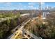 An aerial view featuring local roads with light traffic and skyline in the distance at 821 Ralph Mcgill Ne Blvd # 3104, Atlanta, GA 30306