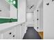 Bathroom featuring a white vanity, sleek black fixtures, and hexagon tile floors at 821 Ralph Mcgill Ne Blvd # 3104, Atlanta, GA 30306