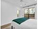 Bedroom featuring a large window with a view of the outdoors and a ceiling fan at 821 Ralph Mcgill Ne Blvd # 3104, Atlanta, GA 30306