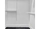 Walk-in closet featuring shelving units and a black tiled floor at 821 Ralph Mcgill Ne Blvd # 3104, Atlanta, GA 30306