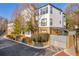 A well-maintained building exterior, showing a side street and lush greenery at 821 Ralph Mcgill Ne Blvd # 3104, Atlanta, GA 30306
