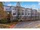 A multi-story condominium building featuring neutral colors and large windows offering ample natural light at 821 Ralph Mcgill Ne Blvd # 3104, Atlanta, GA 30306