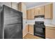 Kitchen features stainless steel appliances, light wood cabinets, and a white tile backsplash at 821 Ralph Mcgill Ne Blvd # 3104, Atlanta, GA 30306