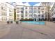Relax and unwind by the community pool, surrounded by lounge chairs and modern architecture at 821 Ralph Mcgill Ne Blvd # 3104, Atlanta, GA 30306