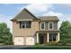 Charming two-story home with brick and gray siding and a well-manicured front lawn at 113 Maplewood Ln, Conyers, GA 30094