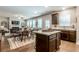 Spacious open concept living space with kitchen, dining area, and living room with hardwood floors at 113 Maplewood Ln, Conyers, GA 30094