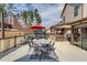 Spacious back deck with an outdoor kitchen, dining set, and seating area at 1217 Trophy Club Ave, Dacula, GA 30019