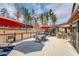 Large deck with outdoor kitchen, dining area, and additional lounge seating at 1217 Trophy Club Ave, Dacula, GA 30019
