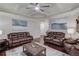 Spacious living room showcasing hardwood floors, modern decor, and comfortable seating at 1217 Trophy Club Ave, Dacula, GA 30019