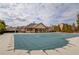 Community pool area showing a large pool with an adjacent clubhouse for neighborhood residents at 1217 Trophy Club Ave, Dacula, GA 30019