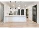 Bright kitchen featuring white cabinets, stainless steel appliances, pendant lighting, and quartz countertops at 625 Piedmont Ne Ave # 2004, Atlanta, GA 30308