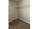 Walk-in closet featuring neutral walls and wire shelving for organization at 3305 Wickum Sw Rd, Atlanta, GA 30349