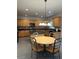 Spacious kitchen with granite countertops, wooden cabinets, stainless steel appliances, and center island at 3305 Wickum Sw Rd, Atlanta, GA 30349