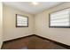 Bedroom featuring hardwood floors and natural light from windows with blinds at 664 Church Nw St, Atlanta, GA 30318