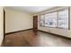Inviting living room with large windows for natural light and hardwood flooring at 664 Church Nw St, Atlanta, GA 30318
