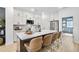 Modern kitchen with white cabinets, stainless steel appliances, and a large center island with seating at 224 Village Overlook # K3, Canton, GA 30114