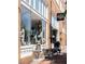 Charming storefront with large windows showcasing retail displays and open signs at 224 Village Overlook # K3, Canton, GA 30114