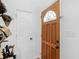 Entryway featuring a decorative front door, a hardwood door and white walls at 583 Mount Zion Rd, Oxford, GA 30054