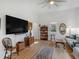 Bright living room with a flat screen tv, hardwood floors, and decor at 583 Mount Zion Rd, Oxford, GA 30054