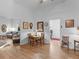 A view of the living room area adjacent to the dining room with hardwood floors at 583 Mount Zion Rd, Oxford, GA 30054