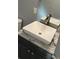 Modern bathroom sink sits on a stylish vanity with grey granite countertop at 814 Humphries Sw St, Atlanta, GA 30310