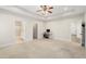 Expansive bedroom with carpeted floors, ensuite bathroom, and walk-in closet at 106 Saint Margrit Cir, Stockbridge, GA 30281