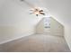 Bedroom with ceiling fan, carpet, and a window with natural light at 106 Saint Margrit Cir, Stockbridge, GA 30281