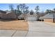 Beautiful brick single-story home with a two-car garage and a long concrete driveway at 106 Saint Margrit Cir, Stockbridge, GA 30281