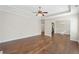 Open living room featuring hardwood floors, recessed lighting, and neutral walls at 106 Saint Margrit Cir, Stockbridge, GA 30281