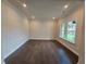 Bright and spacious office with natural light and hardwood flooring, ready for work at 3687 Thornhill Ct, Douglasville, GA 30135
