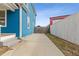 View of the concrete driveway along the side of the house leading to the backyard at 1598 Jonesboro Se Rd, Atlanta, GA 30315