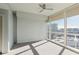 Bedroom features city views through large windows, natural light, and carpet flooring at 3325 Piedmont Ne Rd # 1502, Atlanta, GA 30326