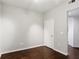 Bedroom boasts hardwood floors, neutral walls, and natural light from hallway at 3325 Piedmont Ne Rd # 1502, Atlanta, GA 30326