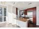 Modern kitchen features stainless steel appliances, granite countertops, and natural light from large windows at 3325 Piedmont Ne Rd # 1502, Atlanta, GA 30326