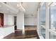 View of the open concept living room and kitchen with hardwood floors and lots of natural light at 3325 Piedmont Ne Rd # 1502, Atlanta, GA 30326