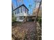 Charming two-story home with deck and covered parking, surrounded by trees at 362 Old Ivy Ne Rd, Atlanta, GA 30342