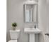 Clean bathroom featuring a pedestal sink and neutral decor at 539 Walton Dr, Woodstock, GA 30188