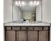 Bathroom featuring a double vanity with granite countertops and plenty of storage space at 539 Walton Dr, Woodstock, GA 30188