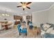 Bright, open living area connecting kitchen and dining with modern furnishings at 539 Walton Dr, Woodstock, GA 30188
