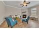 Comfortable living room with fireplace, hardwood floors, and plenty of natural light at 539 Walton Dr, Woodstock, GA 30188