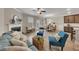 Spacious open-concept living room with fireplace, natural light, and stylish decor at 539 Walton Dr, Woodstock, GA 30188