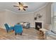 Cozy living room featuring a fireplace, comfortable seating, and neutral decor at 539 Walton Dr, Woodstock, GA 30188
