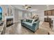 Living space with an open floorplan and a fireplace featuring views into the dining room at 539 Walton Dr, Woodstock, GA 30188