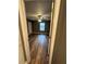 Bedroom with ceiling fan, window, and modern wood-look flooring at 5768 Windgate Ln, Lithonia, GA 30058