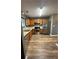 Modern kitchen featuring stainless steel appliances and hardwood flooring at 5768 Windgate Ln, Lithonia, GA 30058
